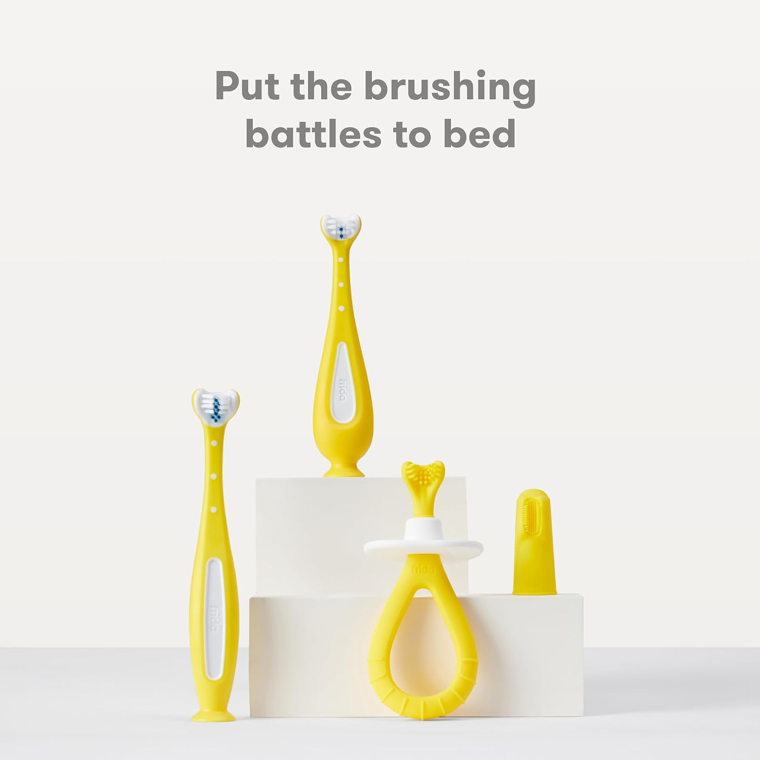 Frida Baby Grow-with-Me Training Toothbrush Set,Infant Baby Tooth Brush & Toddler Toothbrush 6-18 Months,Soft Silicone Bristles,BPA-Free Oral Care for Sensitive Gums,Yellow,(Pack of 12)