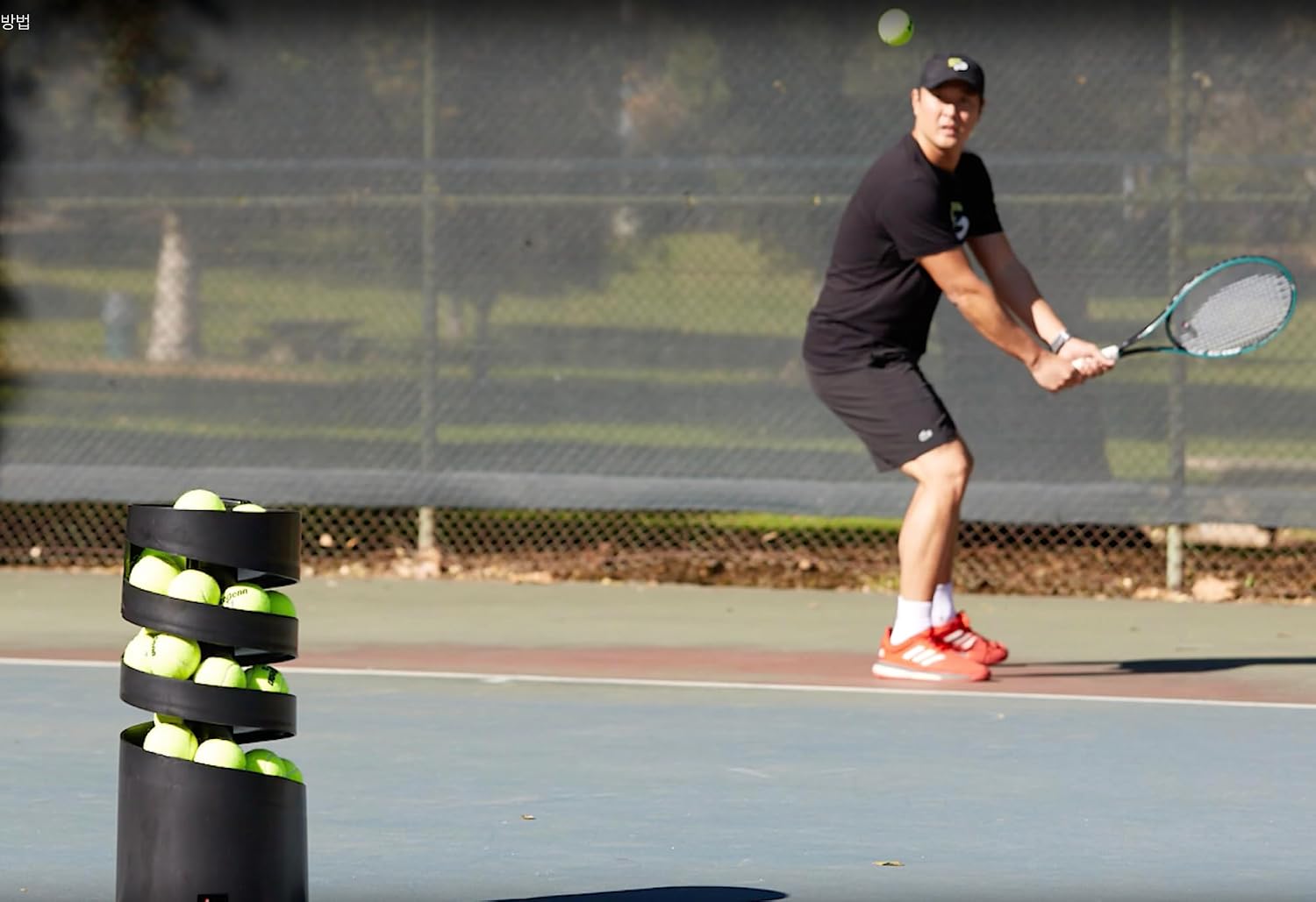 Sports Tutor Tennis Twist Ball Machine - for Beginners - Battery Powered. Adjustable Toss. Made in USA by #1 Tennis Machine Company