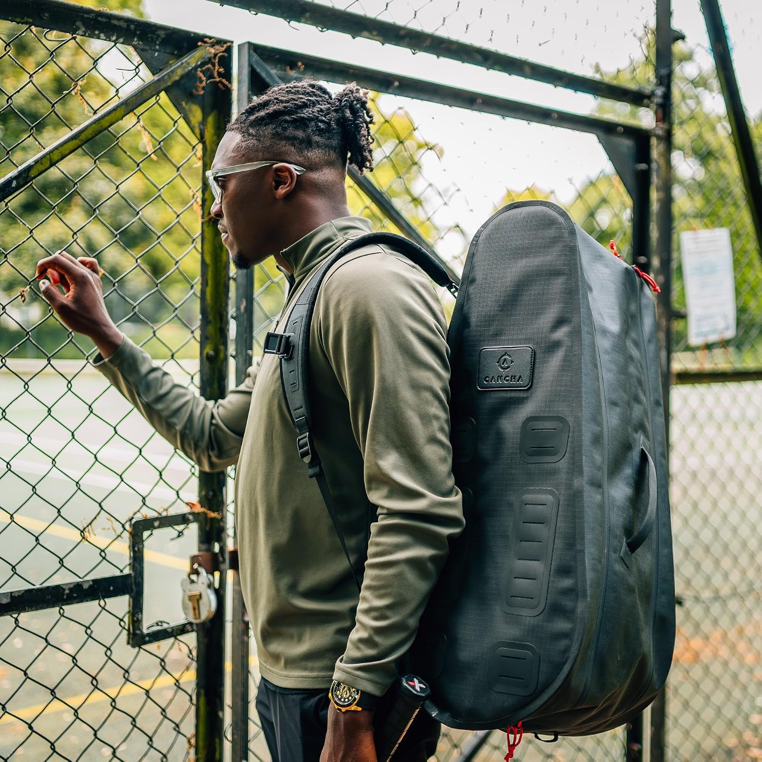 Cancha Racquet Bag Pro, Weatherproof 6-Racquet Tennis Bag for Travel, Black | Ventilated shoe pocket, padded straps and multi-compartment storage for shoes, clothes and gear. Recycled ripstop nylon.