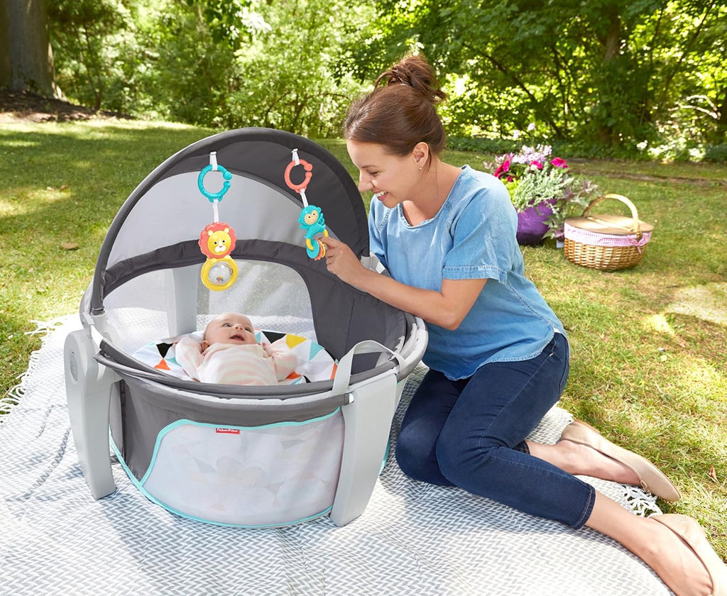 Fisher-Price Portable Bassinet On-The-Go Baby Dome, Travel Play Space with Developmental Newborn Toys & Canopy, Windmill