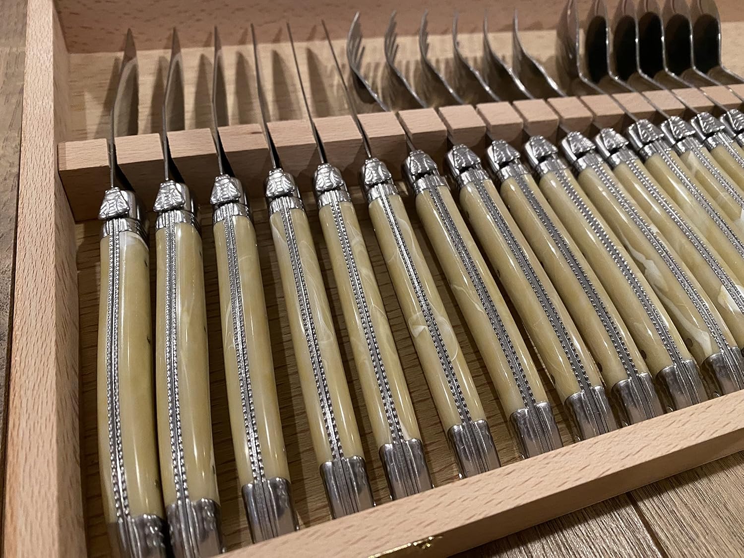 Set of 24 Flatware with Platine Pale Horn Handles, 6 Forks, 6 Knives, 6 Teaspoons and 6 Tablespoons. In Wooden Gift Box